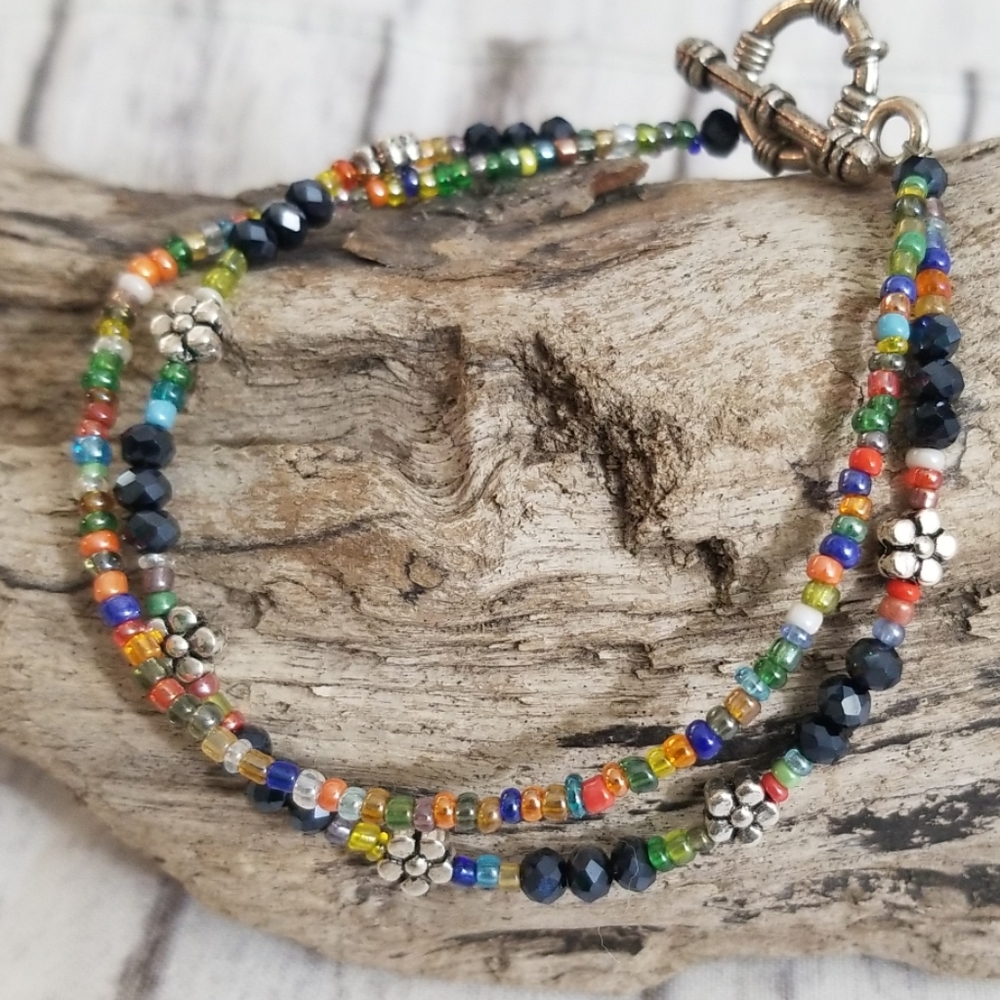 Multi colored 2 strand glass beaded bracelet